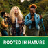 Diverse young adults hiking and laughing in a lush forest, for Beet Root. Banner reads: ROOTED IN NATURE.
