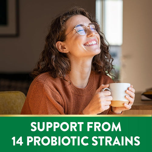 A smiling woman in round glasses holds a mug. Graphic: SUPPORT FROM 14 PROBIOTIC STRAINS. For Womens Probiotic +Cran.