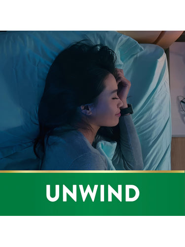 Young woman sleeping peacefully in bed with a smartwatch, featuring Melatonin and Ashwagandha.