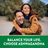 Smiling adult couple enjoying a piggyback ride outdoors. Text overlay reads: 'BALANCE YOUR LIFE, CHOOSE ASHWAGANDHA'.