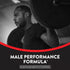 Man weightlifting with a bottle of Male Performance Formula nearby.