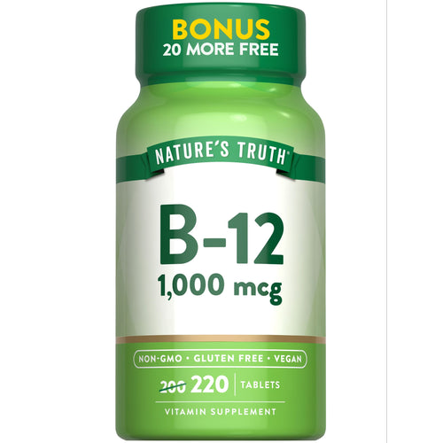 Nature's Truth B-12, 1,000 mcg, 220 tablets, shown on a hand scale, conveying the bulk size of the bottle.