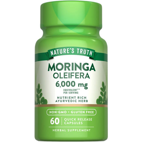 Moringa Oleifera 6,000 mg per serving, 60 Quick Release Capsules, Herbal Supplement, shown on a hand scale.