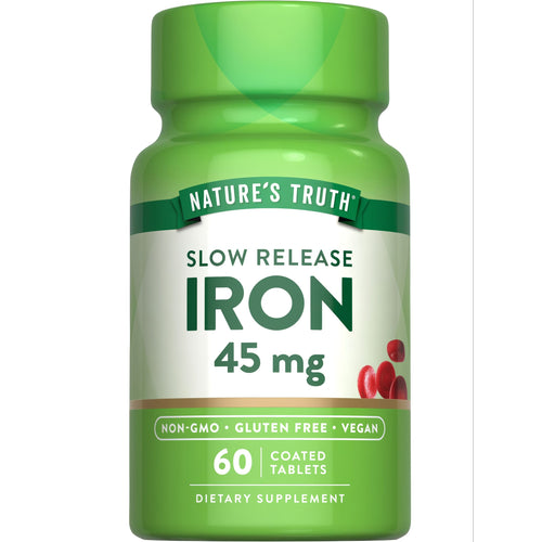 Hand holding a bottle of slow release iron tablets, 45 mg, 60 coated tablets, emphasizing dietary supplement and iron dosage.