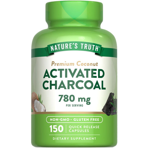 Hand holding bulk scale of Activated Charcoal capsules, 150 count, 780 mg each, for quick release use.