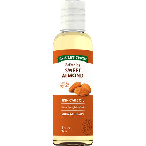 Nature's Truth Softening Sweet Almond Unscented Base Oil in a 4 FL. OZ. (118 mL) bottle on a hand scale.