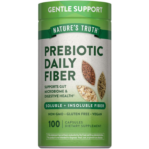 Nature's Truth Prebiotic Daily Fiber, 100 capsules displayed on a hand scale, indicating weight and serving size.