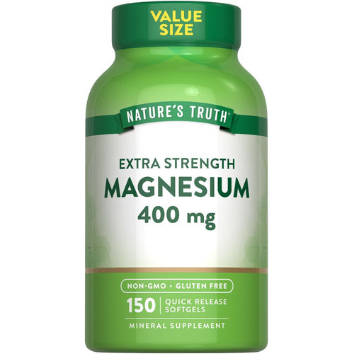 Hand holding a bottle of Magnesium 400 mg Quick Release Softgels, showcasing the size and scale of the product packaging.