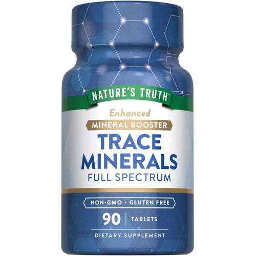 Bottle of Nature's Truth Trace Minerals Full Spectrum, containing 90 tablets, shown on a hand scale to indicate its size.