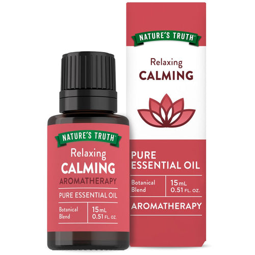 A 15 mL (0.51 FL. OZ.) bottle and box of Relaxing Calming Pure Essential Oil shown on a neutral background.