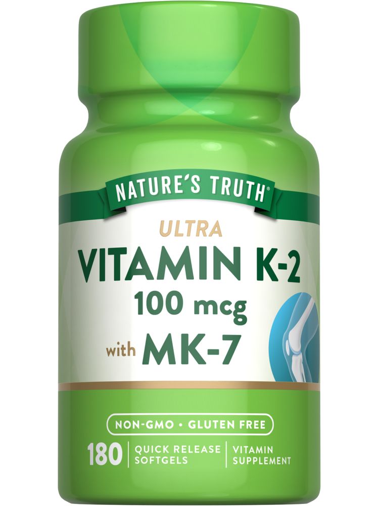 Vitamin K-2 100 mcg with MK-7 Quick Release Softgels on a hand scale, showcasing the size and quantity in bulk.