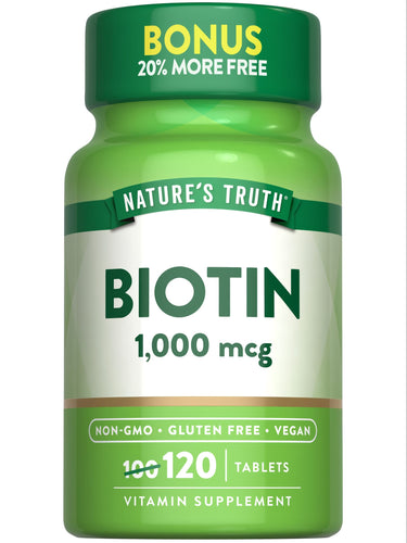 Biotin 1,000 mcg bottle with 120 tablets shown on a hand scale.