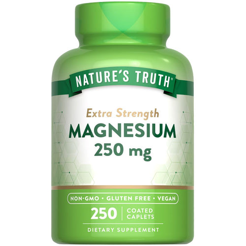 Nature's Truth Extra Strength Magnesium 250 mg, 250 coated caplets shown on a hand scale.