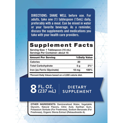 Hand holding NT Liquid Iron, 8 FL. OZ. (237 mL) Dietary Supplement.