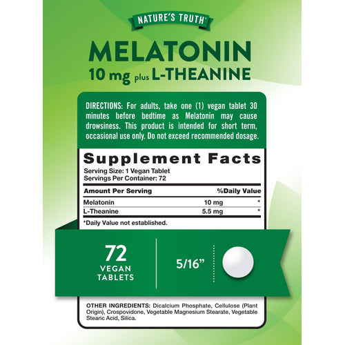 A vegan dietary supplement tablet measuring 5/16 inches, shown on a scale with a hand for size reference.