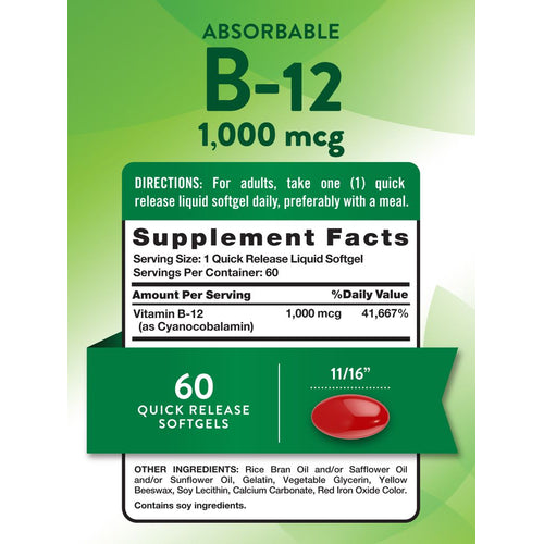 A red oval quick release softgel measuring 11/16 inches on a hand scale, showing size and shape for easy reference.