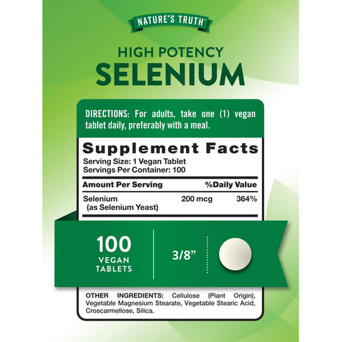 View 2 A white round vegan tablet measuring 3/8 inches sits on a bulk scale for measurement.