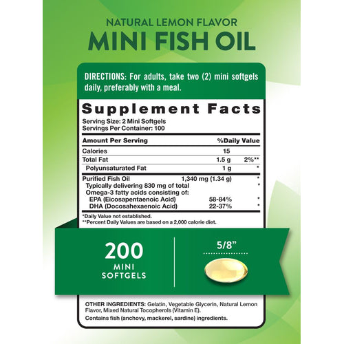 A yellow oval mini softgel in hand, measuring 5/8 inch.