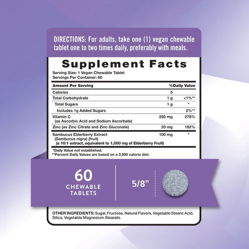 A 5/8 inch vegan chewable tablet held in hand, showing size and scale for reference.
