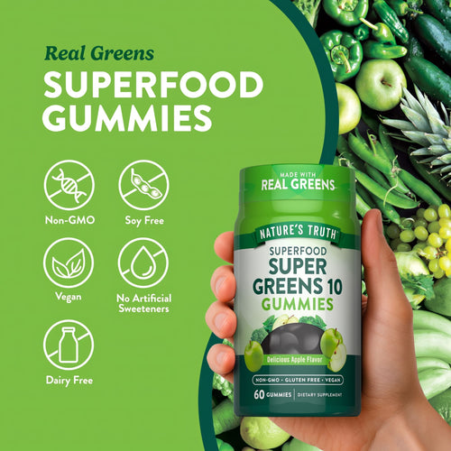 A hand holds a bottle of Super Greens 10 Gummies, containing 60 gummies.