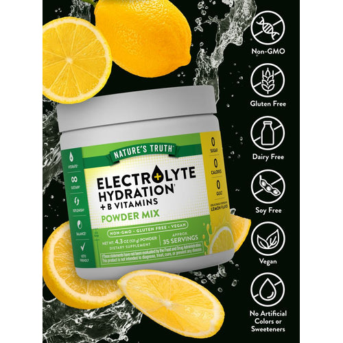 Hand holding a 4.3 oz (121 g) packet of Electrolyte Hydration with B Vitamins Powder Mix.