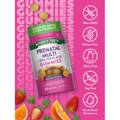Two round yellow prenatal multi gummies shown on a hand scale, highlighting their vibrant color and supplement form.