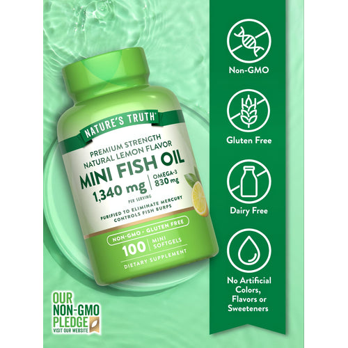 A hand holding a bottle of Mini Fish Oil containing 100 softgels.