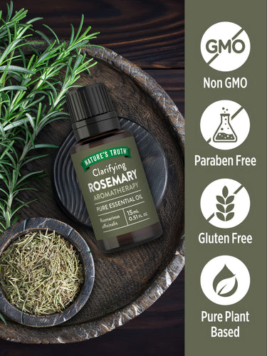 A bottle of rosemary oil labeled as Non GMO, Paraben Free, Gluten Free, and Pure Plant Based.