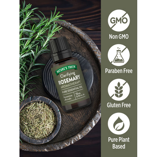 A bottle of rosemary oil labeled as Non GMO, Paraben Free, Gluten Free, and Pure Plant Based.