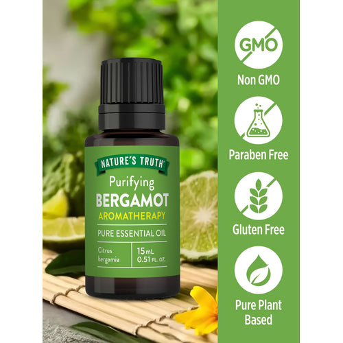 A bottle of bergamot oil labeled as Non GMO, Paraben Free, Gluten Free, and Pure Plant Based.