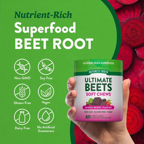 A hand holding Nature's Truth Ultimate Beets Soft Chews, mixed berry flavor, containing 60 soft chews.