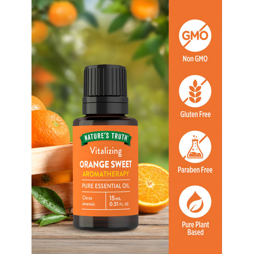 Orange Oil bottle that is Non GMO, Gluten Free, Paraben Free, and Pure Plant Based on a hand scale for precise measurement.
