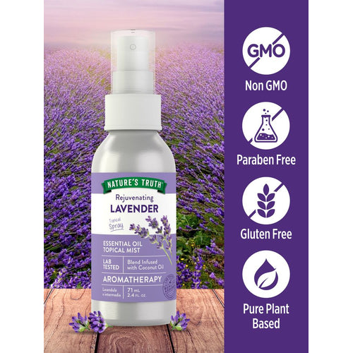 A bottle of Rejuvenating Lavender Topical Spray Essential Oil Mist, 71 mL (2.4 FL. OZ.), shown on a hand for scale.