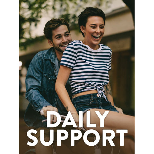 A young couple is happily riding a bicycle together. Image text reads: 'DAILY SUPPORT'.