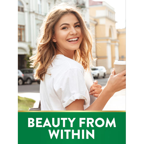 Smiling woman outdoors with laptop and coffee. Green banner with gold trim shows 'BEAUTY FROM WITHIN'.