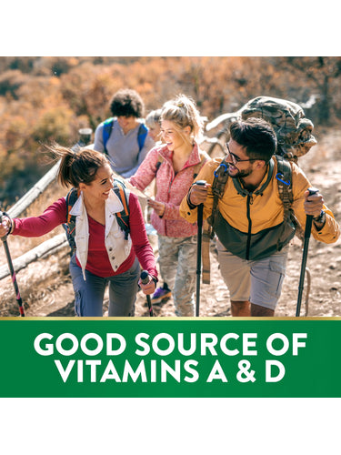 Young adults hiking outdoors and smiling. Graphic text: 'GOOD SOURCE OF VITAMINS A & D'.