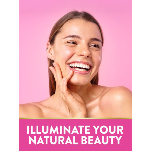 Young woman smiling, touching her cheek against a pink background with the text 'ILLUMINATE YOUR NATURAL BEAUTY'.