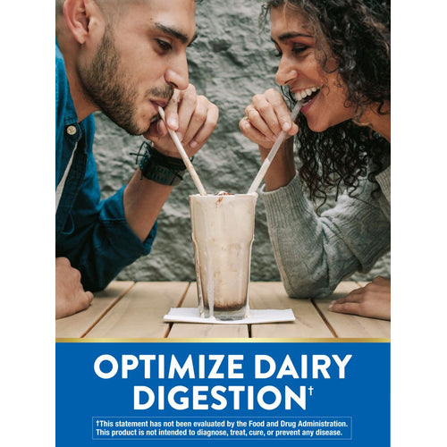 A young man and woman smiling while sharing a milkshake, promoting Lactose Digest.