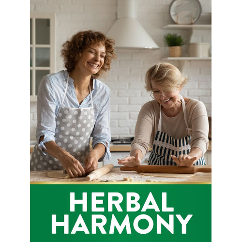 Two women, one younger and one older, laughing and rolling dough in a kitchen, with 'HERBAL HARMONY' text visible.