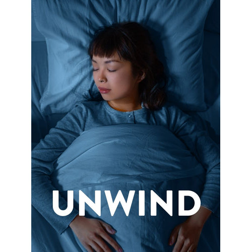 Adult woman sleeping peacefully in bed under blue blankets, with the overlaid text 'UNWIND' promoting Melatonin.