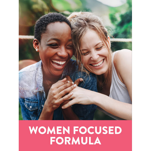 Two young women are laughing and hugging with the graphic text 'WOMEN FOCUSED FORMULA' displayed.