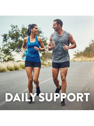 A man and woman jogging on a road, smiling and carrying water bottles. Text: DAILY SUPPORT.