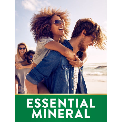 Young adults piggybacking and laughing on a beach, with 'ESSENTIAL MINERAL' text for Magnesium displayed.
