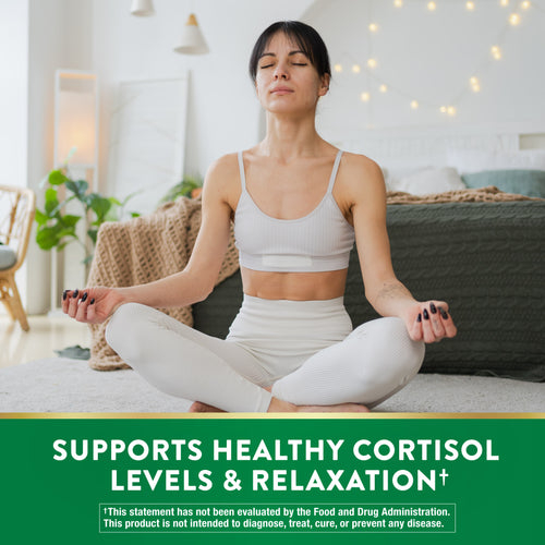 A woman meditating in a light-filled room. Green banner says: Supports Healthy Cortisol Levels and Relaxation.