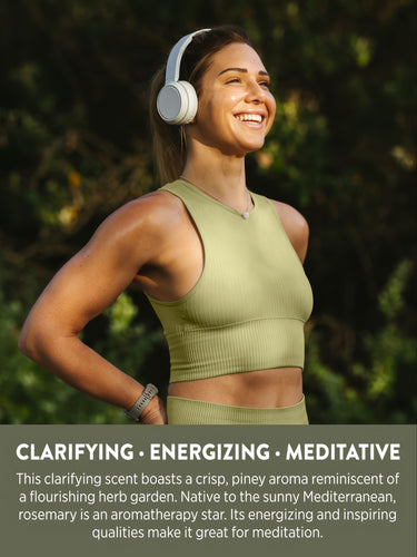 Woman smiling outdoors with text: Clarifying, Energizing, Meditative. Rosemary scent is crisp, piney, Mediterranean.