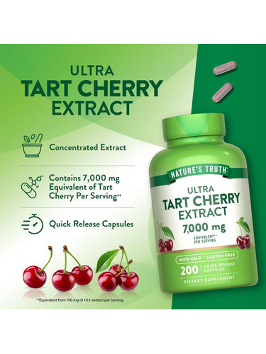 Pink quick release capsules with 7,000 mg equivalent of Tart Cherry Extract per serving, shown on a hand scale.