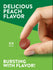 Hand holding a gummy measured at three-fourths of an inch.