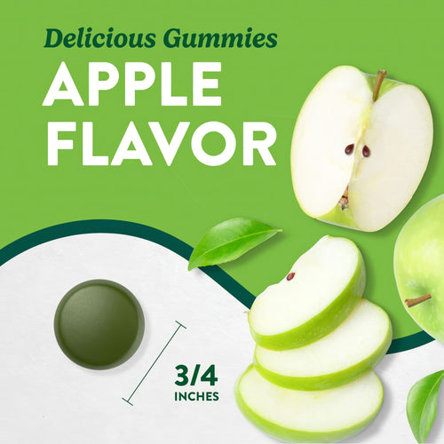 A dark green gummy in a circular shape, measuring three-quarters of an inch in diameter, shown on a scale.