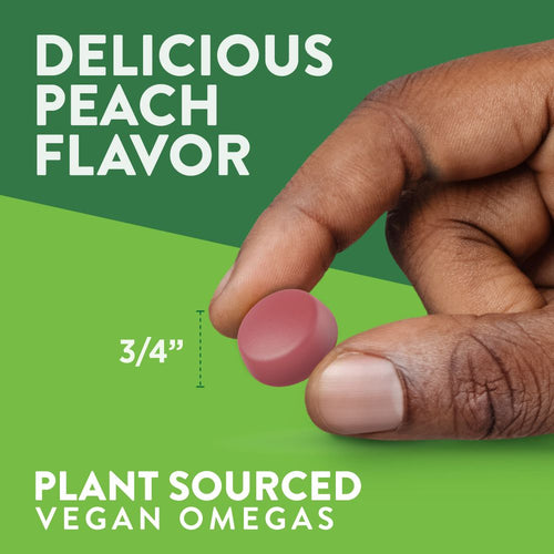 A hand holding a gummy measuring three-fourths of an inch.