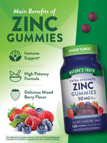 A hand holding two purple zinc gummies, each serving containing 50 MG.